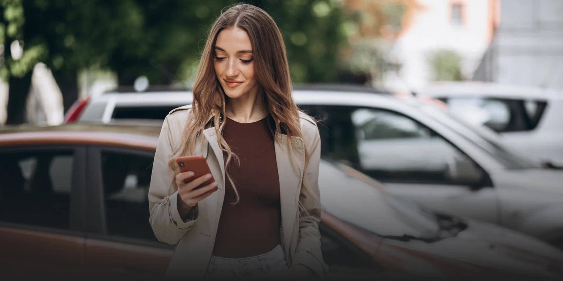 Passenger using RideSafe with cars in the background