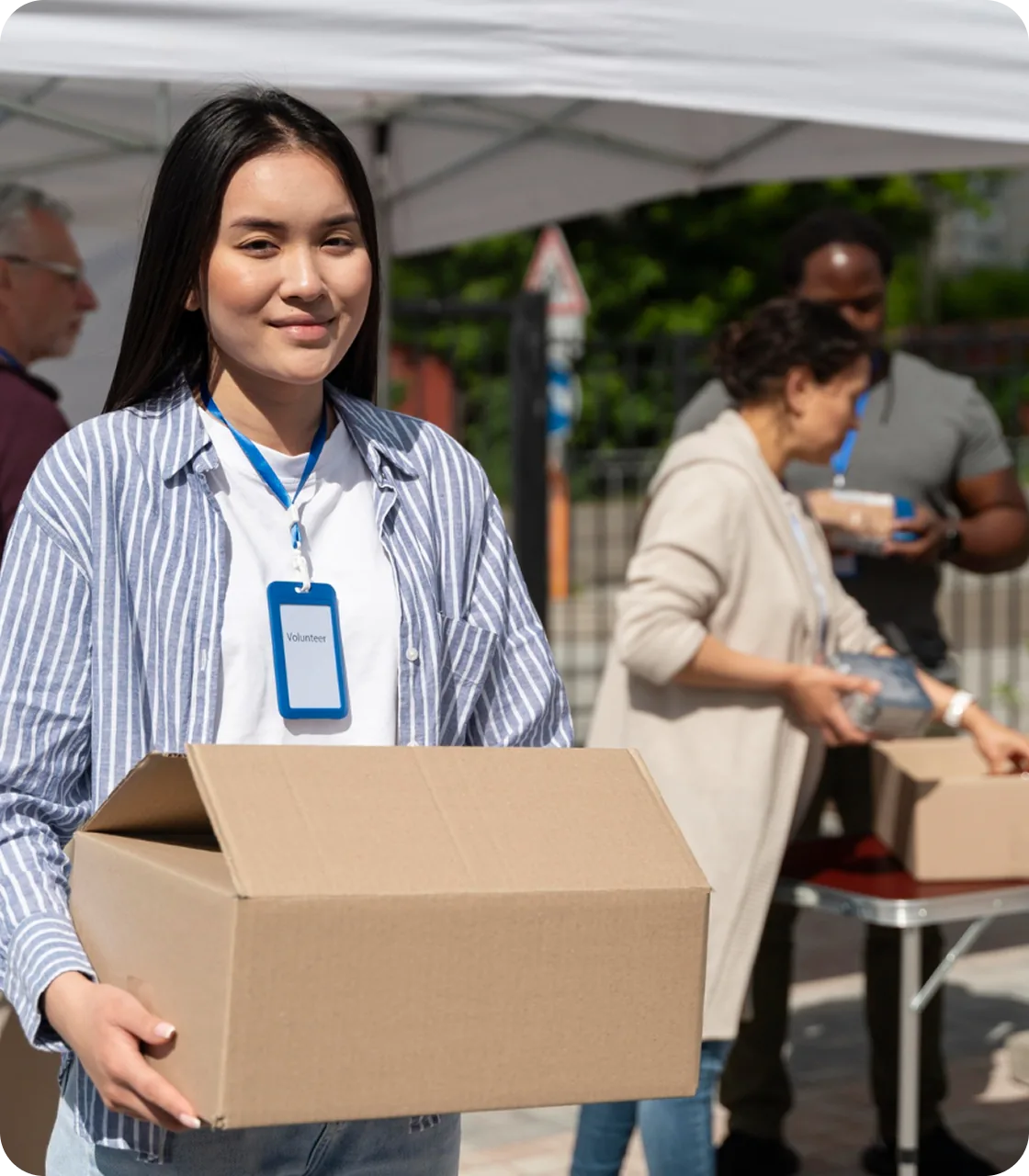 Volunteers working together at a community aid station