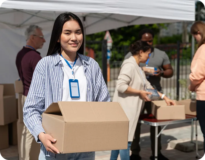 Volunteers working together at a community aid station
